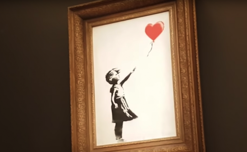 Obra de Banksy se autodestruye luego de ser subastada